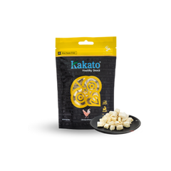 kakato freeze-dried chicken breast snacks in resealable black and yellow pouch with cubed pieces on plate