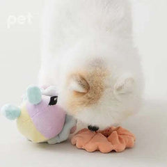 Dog playing with BITE ME Long-Lasting Nosework Clown Toy with treat pockets and squeaker